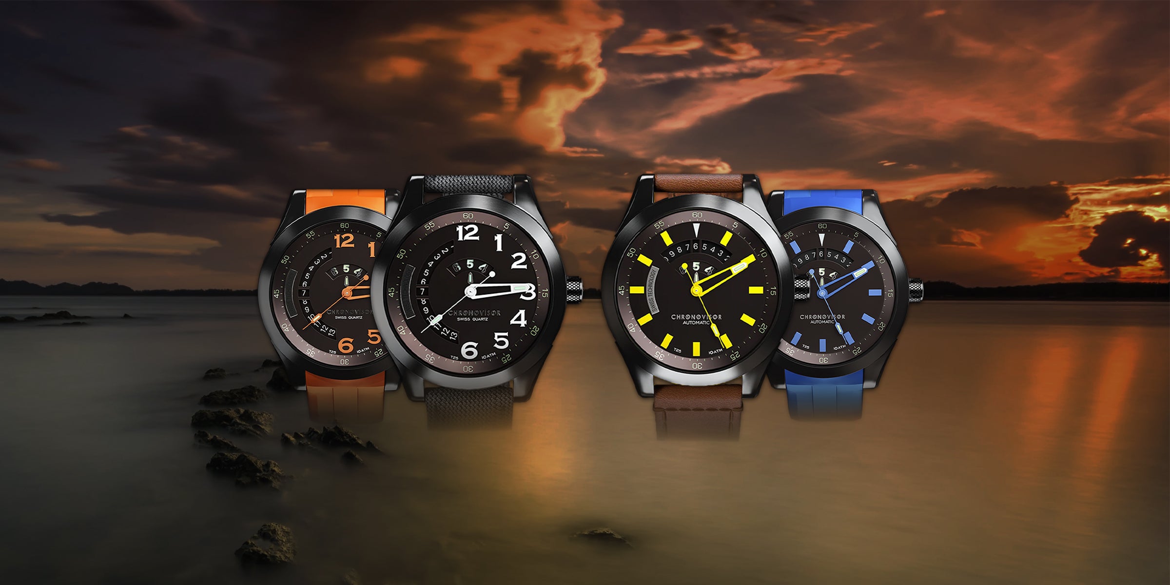 Four watches displayed against a sunset over water backdrop